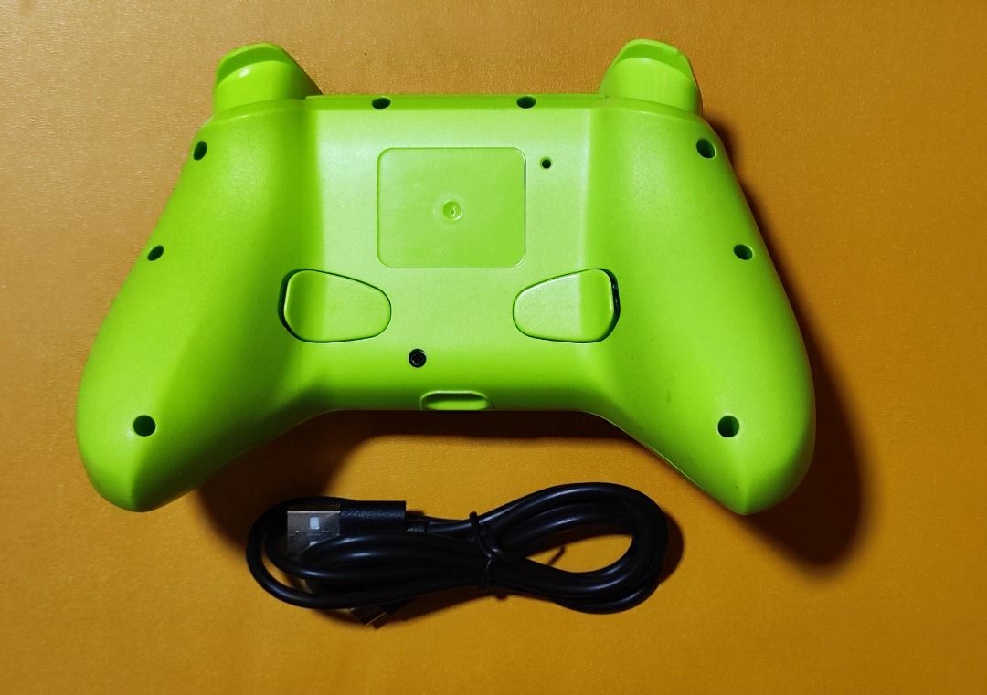 Wireless Game Controller for PC Android Switch (Category: Controllers) located in Las Pinas. Submitted by lance_kun (Listing ID 1448272075, Image 2). Description: NS21 Wireless Gamepad Controller Nintendo Switch, PC, iOS, and Android Bluetooth connectivity, 6-axis gyro motion sensors, and dual-motor vibration Includes USB-C cable, instruction manual, and box Analog Caps damaged (see picture) thumb grips included as cover.