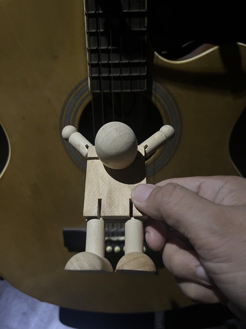 Wooden robot Fidget Toy (Category: Educational & Learning Toys) located in Pasay City. Submitted by beye01 (Listing ID 1448204538, Image 2). Description: This object is a wooden robot fidget toy designed with a block-like body and jointed limbs.The figure is often sold in sets or as an unfinished crafting project meant for painting or personalizing.It typically features stretchy elastic cord joints that allow for posing and movement..
