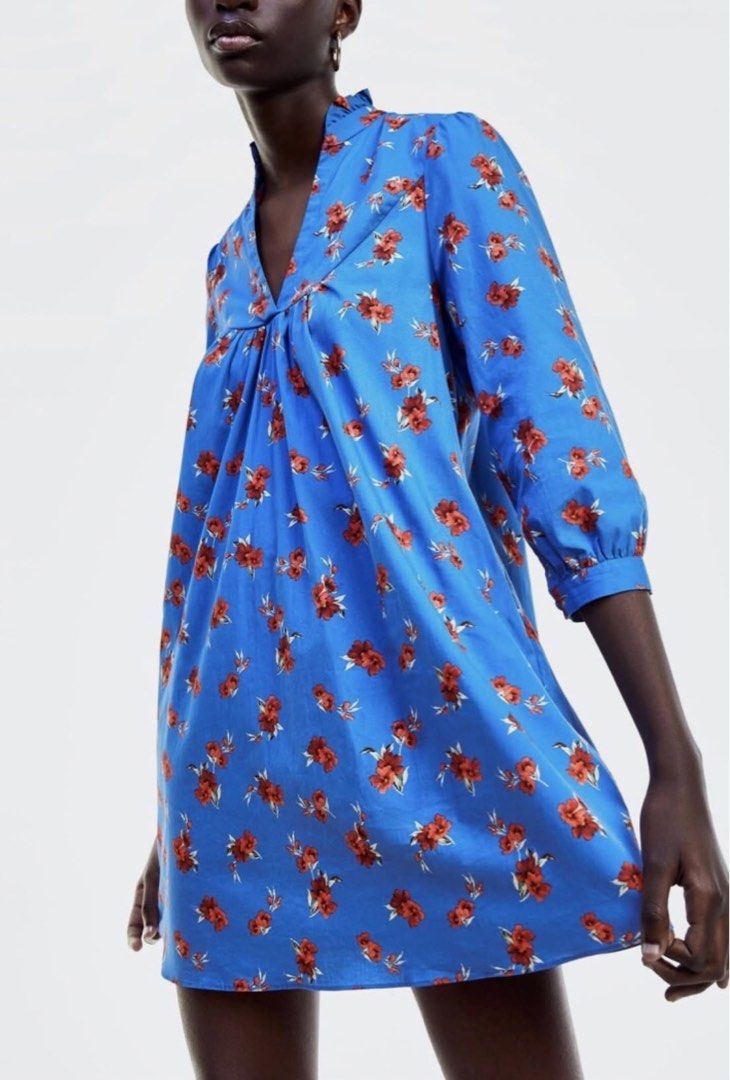 Zara Floral Tunic Dress (Category: Dresses) located in Quezon City. Submitted by onyx72 (Listing ID 1448263872, Image 1). Description: Zara Emma Floral Tunic Dress Vibrant blue base and constracting red floral print Gathered V-neckline Ruffled collar 3/4 length sleeves Lightweight cotton fabric With side pockets🥰 XS on tag but best fits xtra small - small Used ONCE.