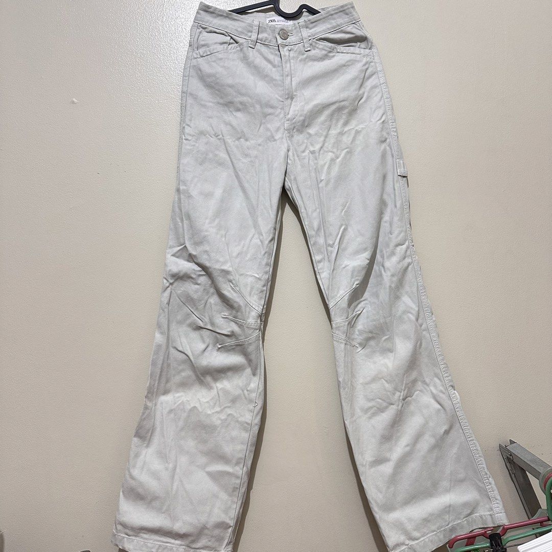 ZARA Light Gray Wide Leg Pants (Category: Other Bottoms) located in Manila. Submitted by preamorph (Listing ID 1448124654, Image 1). Description: - worn once - has minor stains at the lower back (check last 3 pics) - i havent tried washing them again.
