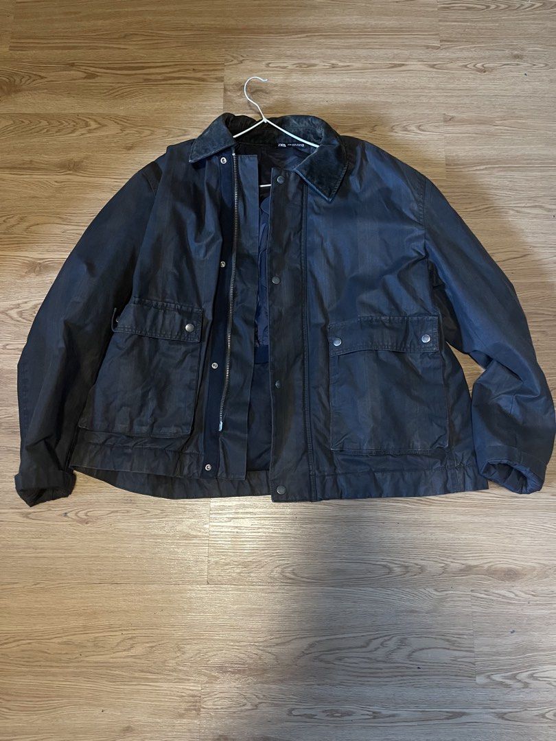 ZARA Men's Dark Grey Utility Jacket (Category: Coats, Jackets and Outerwear) located in Quezon City. Submitted by aaapanda1131221 (Listing ID 1448275531, Image 1). Description: - ZARA Dark Grey Utility Jacket - Zip and button closure - Multiple front pockets - Durable material - Ideal for everyday wear or outdoor activities.
