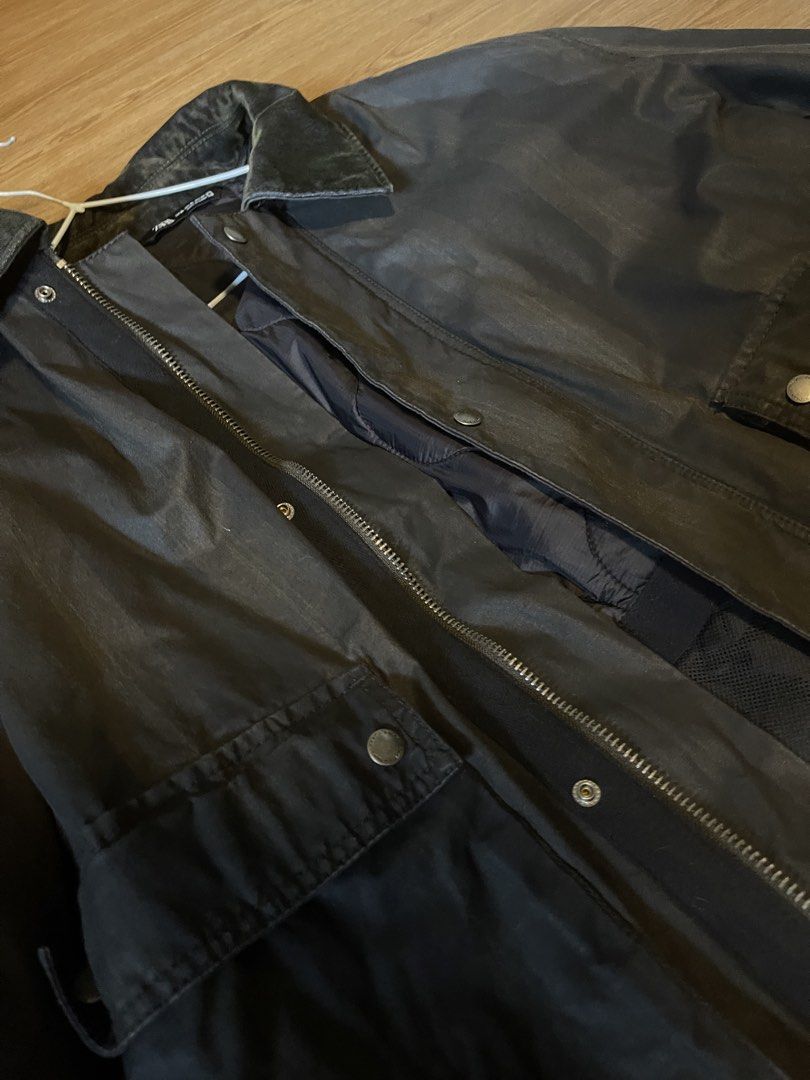 ZARA Men's Dark Grey Utility Jacket (Category: Coats, Jackets and Outerwear) located in Quezon City. Submitted by aaapanda1131221 (Listing ID 1448275531, Image 2). Description: - ZARA Dark Grey Utility Jacket - Zip and button closure - Multiple front pockets - Durable material - Ideal for everyday wear or outdoor activities.
