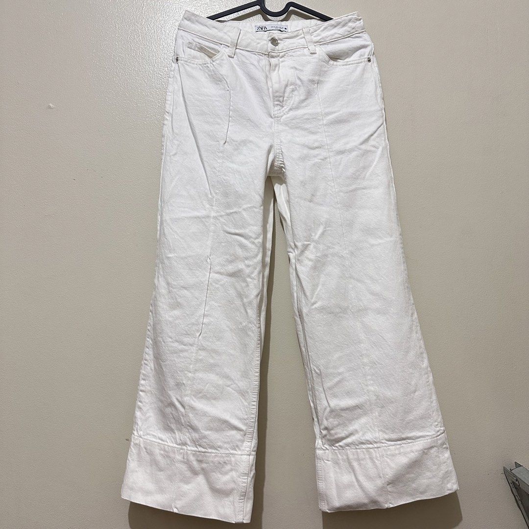 ZARA White Wide Leg Jeans (Category: Jeans) located in Manila. Submitted by preamorph (Listing ID 1448125097, Image 1). Description: - honestly i want to keep this but it no longer fits me :(( - worn once - thick white denim - waist: 28 in.