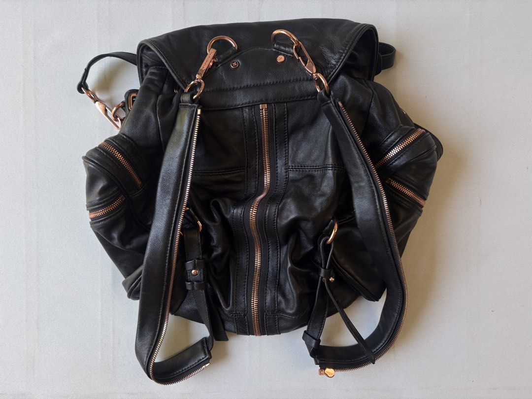 ALEXANDER WANG Marti 3 Way Leather Bag (Category: Backpacks) located in Baguio. Submitted by viibodegaaa (Listing ID 1448420598, Image 2). Description: Very good sign of use, check last 2 pictures sa may sides ng flop ng bag.