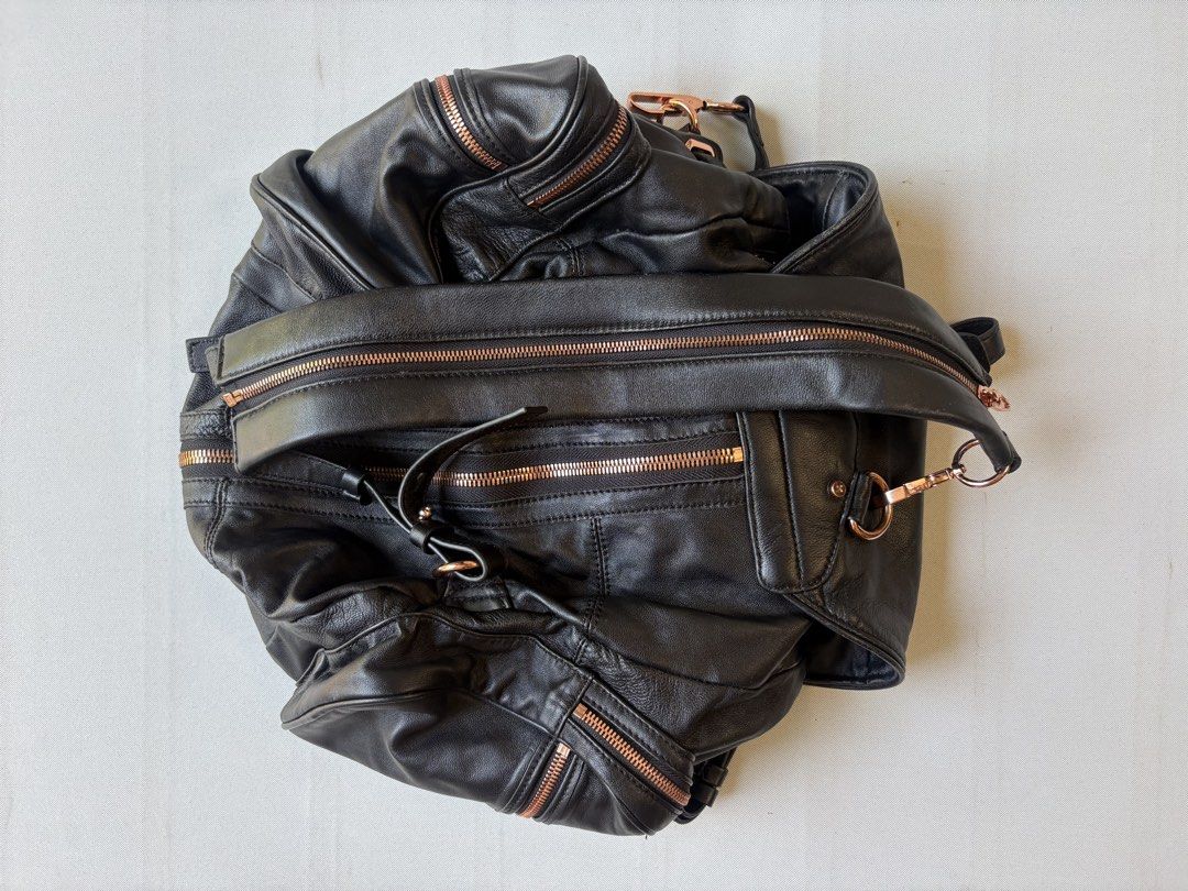 ALEXANDER WANG Marti 3 Way Leather Bag (Category: Backpacks) located in Baguio. Submitted by viibodegaaa (Listing ID 1448420598, Image 3). Description: Very good sign of use, check last 2 pictures sa may sides ng flop ng bag.