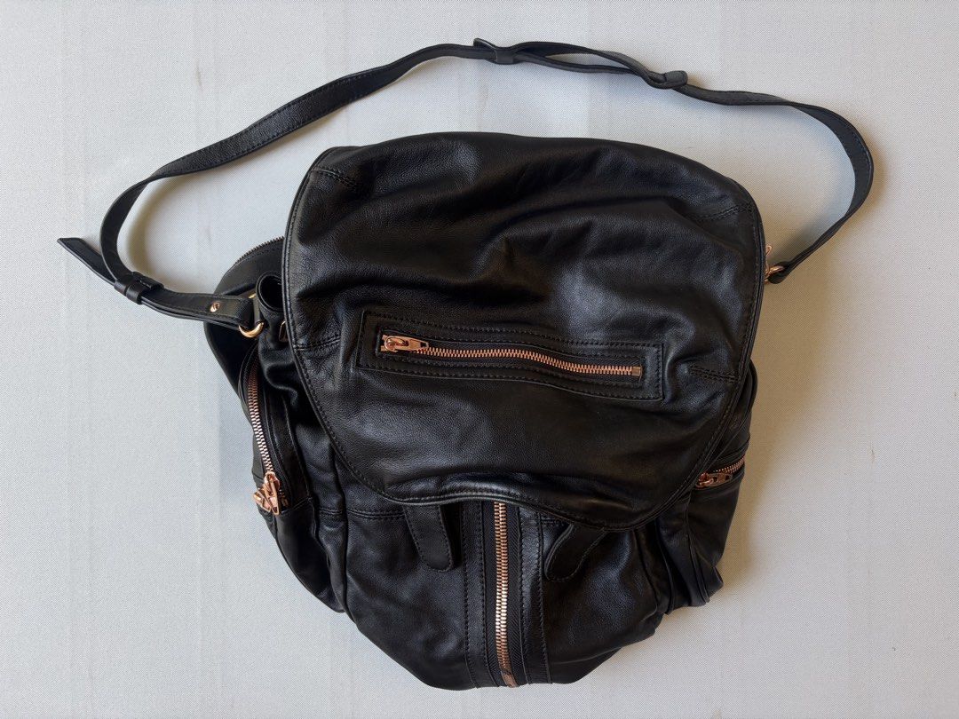 ALEXANDER WANG Marti 3 Way Leather Bag (Category: Backpacks) located in Baguio. Submitted by viibodegaaa (Listing ID 1448420598, Image 1). Description: Very good sign of use, check last 2 pictures sa may sides ng flop ng bag.