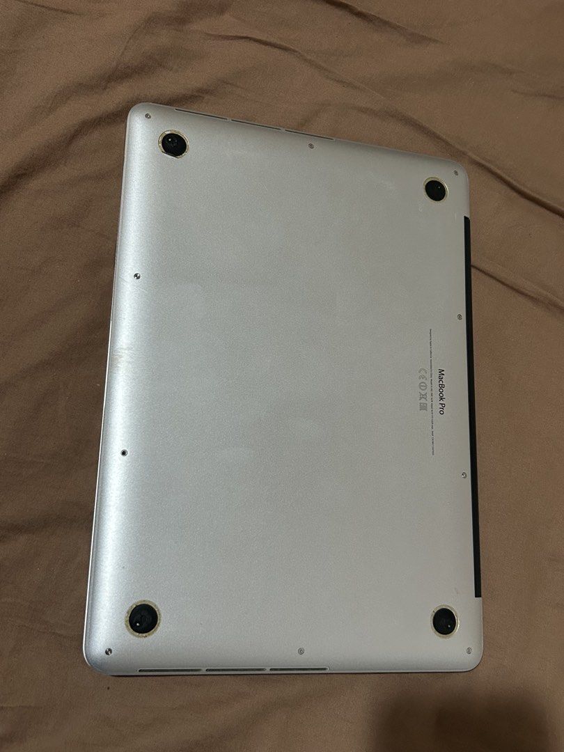 Apple MacBook Pro 13-inch (Category: Laptops & Notebooks) located in Manila. Submitted by lualhatila67605 (Listing ID 1448407664, Image 3). Description: - MacBook Pro 13.3 inch - Silver aluminum body - Working/Functional - Sold as is - No charger included Still nego message me if interested Can still handle daily tasks like web browsing and light office work.
