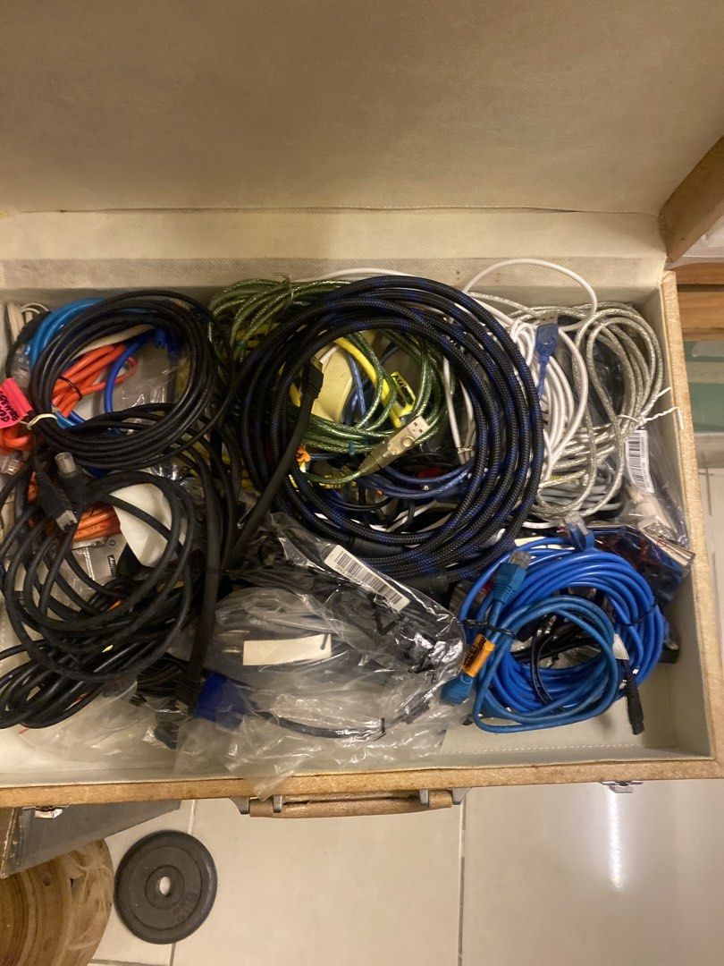 Assorted Computer and Network Cables Bundle (Category: Cables & Adaptors) located in Petaling Jaya. Submitted by clarencey96769 (Listing ID 1448395246, Image 1). Description: - Bundle includes various computer and network cables. - Features Ethernet cables, USB cables, and other assorted connectors. - Ideal for anyone needing spare cables or setting up a new computer. - All cables are neatly coiled and ready for immediate use. - Excellent value b