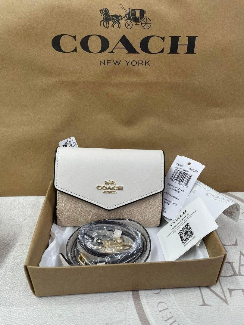 Authentic Coach Sling Wallet for Women (Category: Wallets & Card holders) located in Manila. Submitted by Authentic4Less_OLShop (Listing ID 1448302341, Image 2). Description: Reserve yours now!!! Super nice in actual ☺️🤩 ORIGINAL MALL PULL OUT ✅Brand new ✅New Arrival RESELLERS ARE WELCOME!!!🥰 DISCLAIMER: authenticforless OLShop is not affiliated with any of the brands posted in this account. Copyrights and trademarks are solely of the brand own
