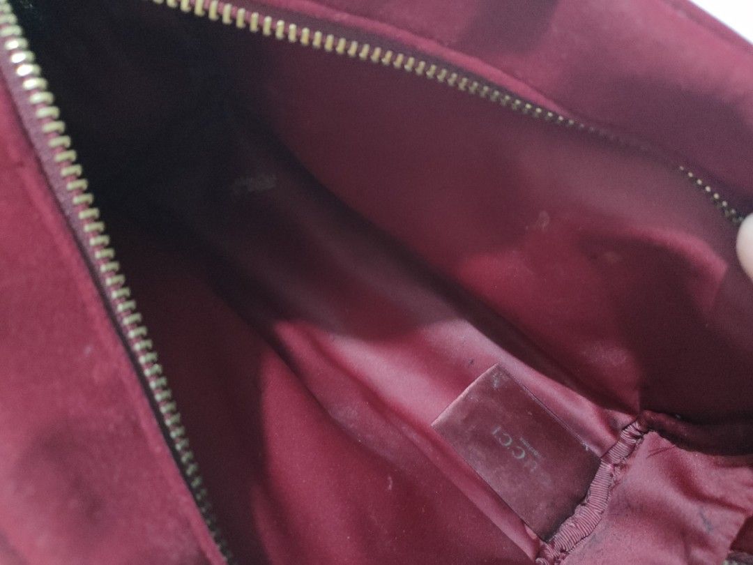 Authentic Red Velvet Gucci Cosmetic Bag (Category: Luxury Bags & Wallets) located in Caloocan City. Submitted by rjb21 (Listing ID 1448283174, Image 3). Description: - Authentic Red Velvet Gucci Cosmetic Bag - Features a secure gold zipper closure with Gucci Perfume tag - Interior includes a small Gucci tag - Minor marks present on exterior velvet and interior lining - Zipper functions smoothly - Ideal for storing makeup or travel essentials.