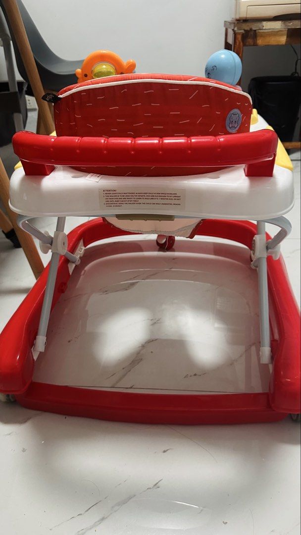 Baby Walker with Toys and Handle (Category: Infant Playtime) located in Paranaque City. Submitted by amari_ (Listing ID 1448337228, Image 3). Description: Giant Carrier baby walker - Used for around 4 months - Sturdy wheels for smooth movement - Ideal for babies learning to walk.