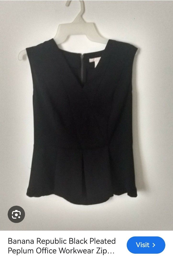Banana Republic black peplum top (Category: Blouses) located in Batangas. Submitted by micaelaul (Listing ID 1448291285, Image 1). Description: Small-medium.