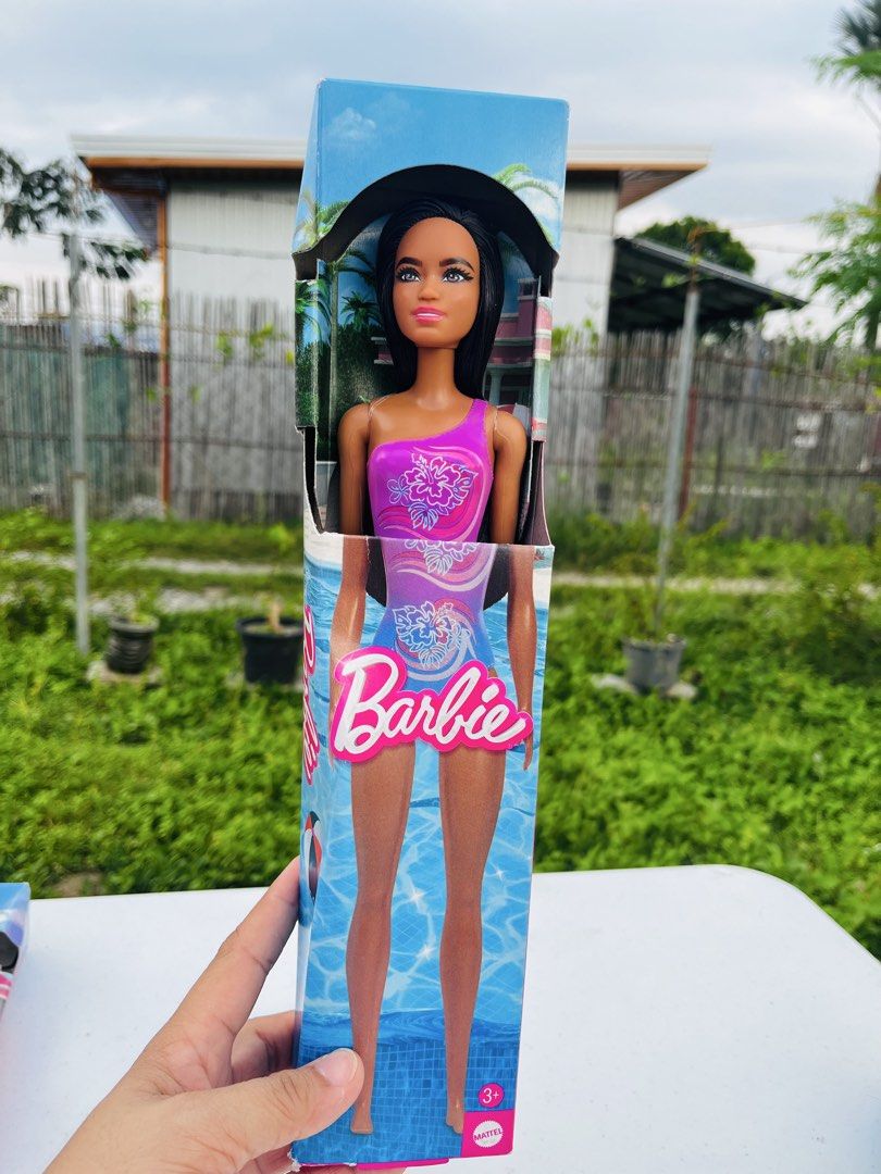 Barbie Doll Assortment - Beach/Pool Themed (Category: Kids Toys) located in Bugallon. Submitted by aennleeza (Listing ID 1448416020, Image 2). Description: 350 each Set of 3 Barbie dolls - Each doll wears a stylish swimsuit - Perfect for beach or pool play - Comes in original packaging - Ideal for collectors or as a gift - Get all three for your collection!.