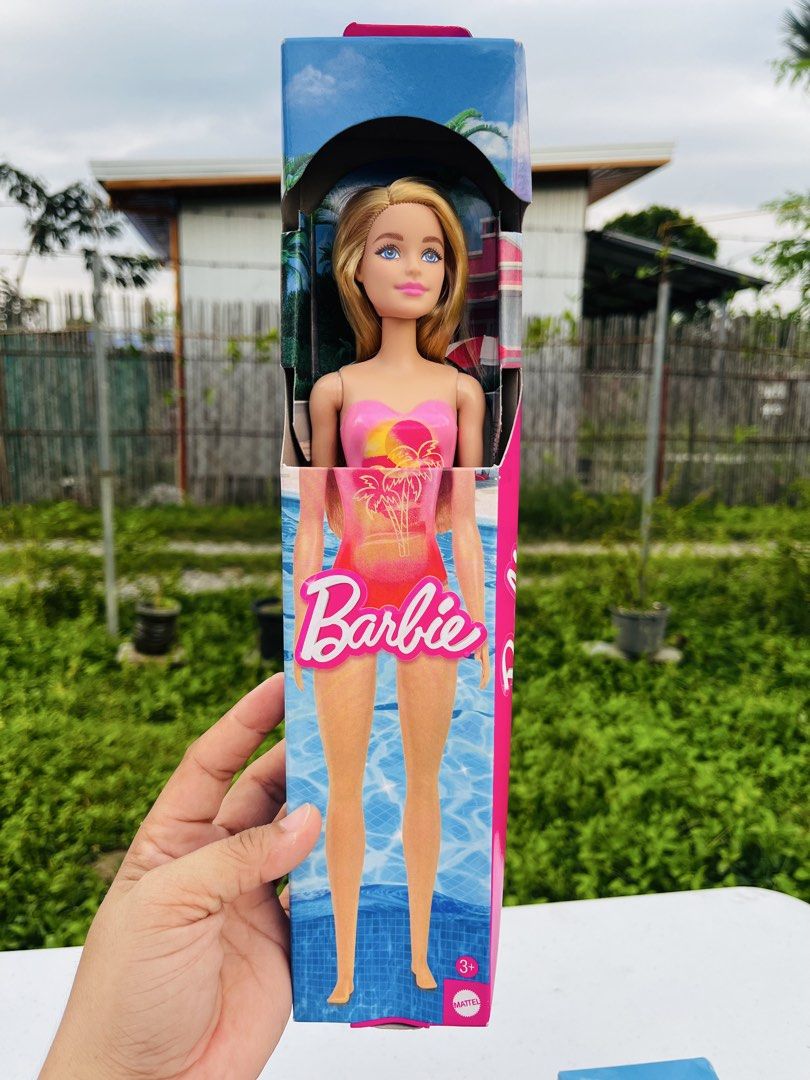 Barbie Doll Assortment - Beach/Pool Themed (Category: Kids Toys) located in Bugallon. Submitted by aennleeza (Listing ID 1448416020, Image 1). Description: 350 each Set of 3 Barbie dolls - Each doll wears a stylish swimsuit - Perfect for beach or pool play - Comes in original packaging - Ideal for collectors or as a gift - Get all three for your collection!.