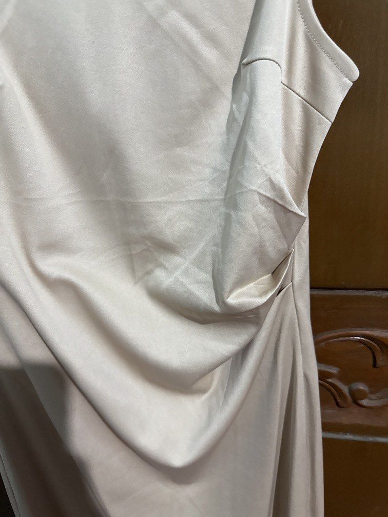 Beige Midi Dress (Category: Dresses) located in Bulacan. Submitted by mirificmaria (Listing ID 1448432210, Image 2). Description: Beige Midi Sleeveless Perfect for attending semi formal event Pang wedding invites and birthdays.