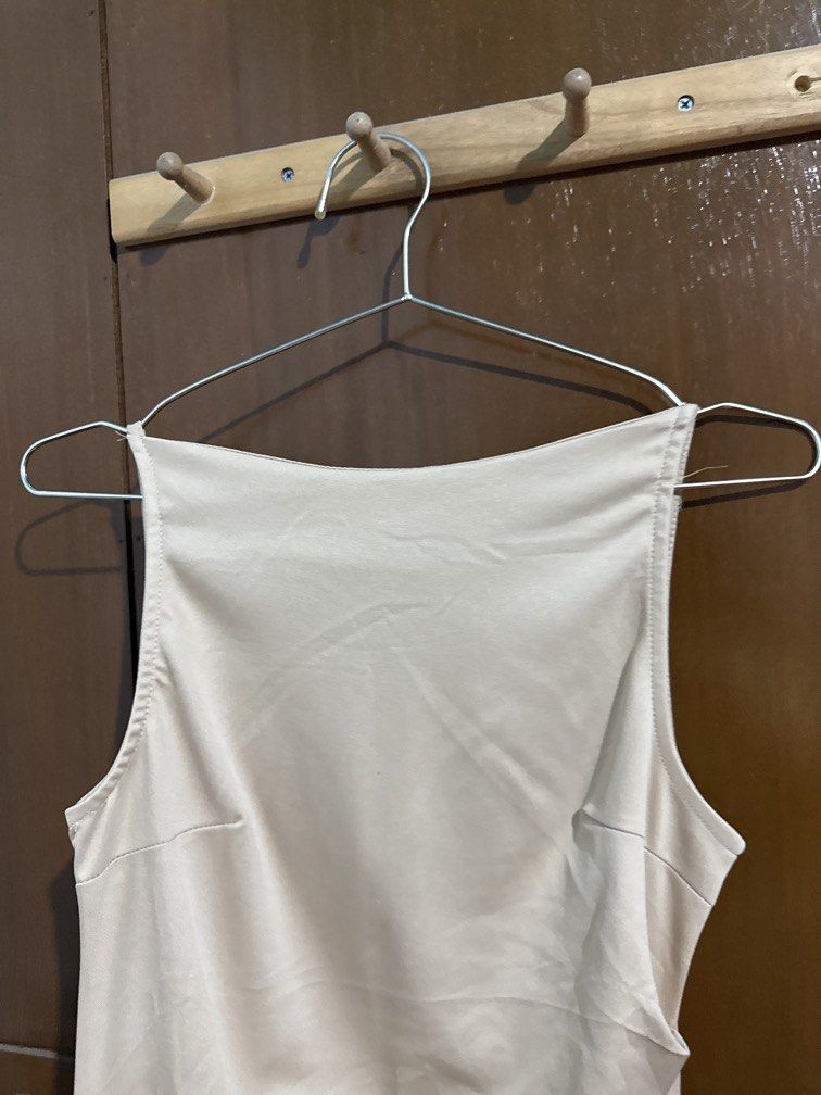 Beige Midi Dress (Category: Dresses) located in Bulacan. Submitted by mirificmaria (Listing ID 1448432210, Image 3). Description: Beige Midi Sleeveless Perfect for attending semi formal event Pang wedding invites and birthdays.
