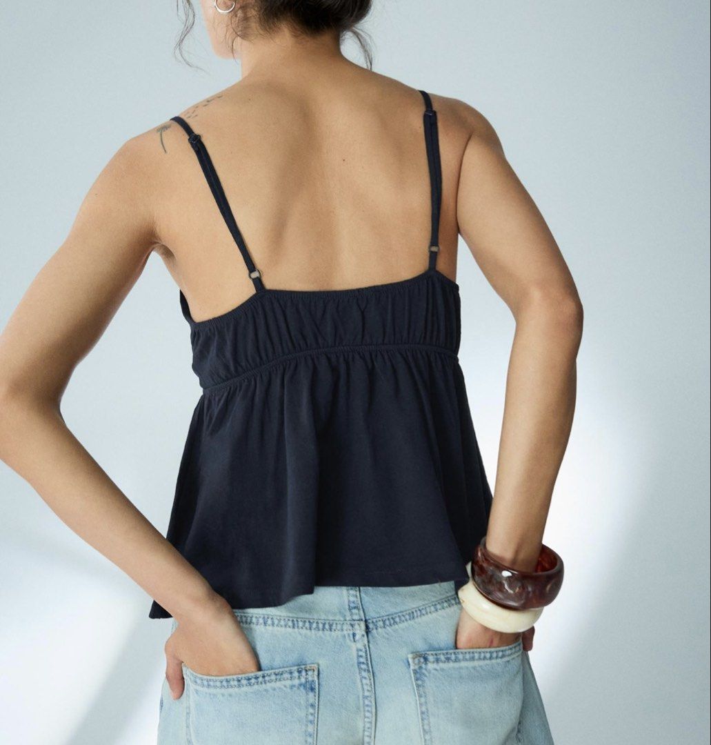 Bershka Navy Blue Cami Top with Adjustable Straps (Category: Sleeveless) located in Taguig. Submitted by barbequeIU (Listing ID 1448294324, Image 2). Description: medium on tag but can fit xs-s srp 795 but selling low since used this once for laufey concert.