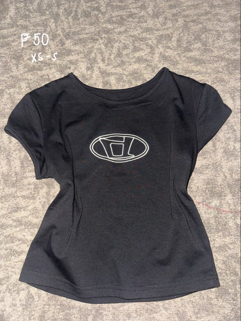 Black D/ies/el Shirt (Category: Shirts) located in Batangas. Submitted by chaeeyi (Listing ID 1448385061, Image 1). Description: XS - S Worn Once MOP : Gcash (payment first only) MOD : JnT.