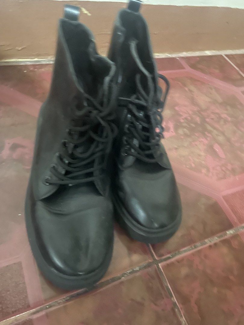 Black Lace-Up Combat Boots with Side Zip (Category: Boots) located in Quezon City. Submitted by hfe.internationale (Listing ID 1448416759, Image 1). Description: - Black combat boots - Lace-up front with side zipper for easy wear - Chunky platform sole - Perfect for everyday wear - Minor scuffs on toe area.