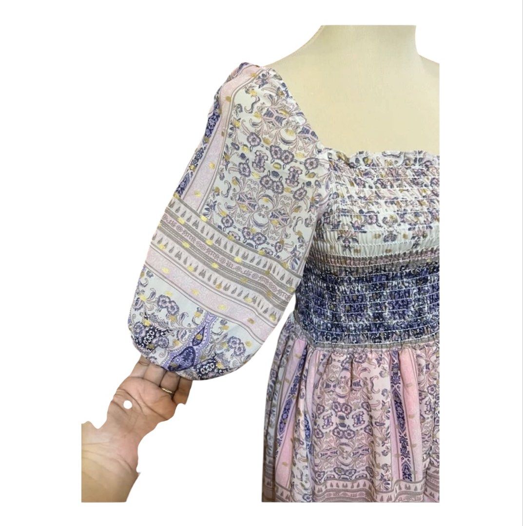 Boho Smocked Square Neck Midi Dress (Category: Dresses) located in Quezon City. Submitted by letsdeclutter101 (Listing ID 1448426292, Image 2). Description: - Pretty boho style midi dress - Features a smocked bodice - Square neckline - Puff sleeves - Pink, purple, and blue floral print - Ideal for casual outings or a day out.