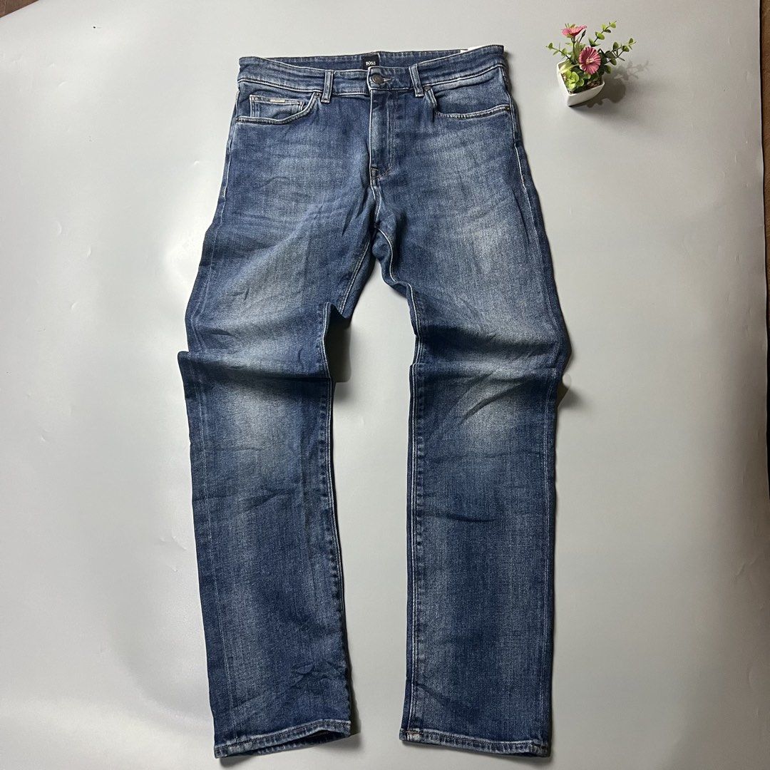 BOSS Blue Wash Denim Jeans (Category: Jeans) located in Bago City. Submitted by g___shop (Listing ID 1448478566, Image 1). Description: - Classic blue wash jeans from BOSS - Straight leg fit - Button and zip closure - Multiple pockets for convenience - Great for everyday wear - Waistline 32-34 Stretchable .