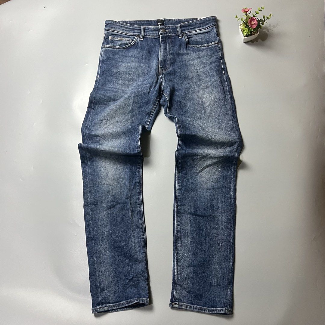 BOSS Blue Wash Denim Jeans (Category: Jeans) located in Bago City. Submitted by g___shop (Listing ID 1448478566, Image 2). Description: - Classic blue wash jeans from BOSS - Straight leg fit - Button and zip closure - Multiple pockets for convenience - Great for everyday wear - Waistline 32-34 Stretchable .