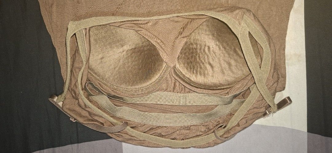 Brown Padded Camisole Tank Top (Category: Sleeveless) located in Valenzuela. Submitted by thriftlets (Listing ID 1448418316, Image 2). Description: - Brown camisole - Built-in padding - Adjustable straps - Soft fabric - Versatile: great for layering or wearing on its own.
