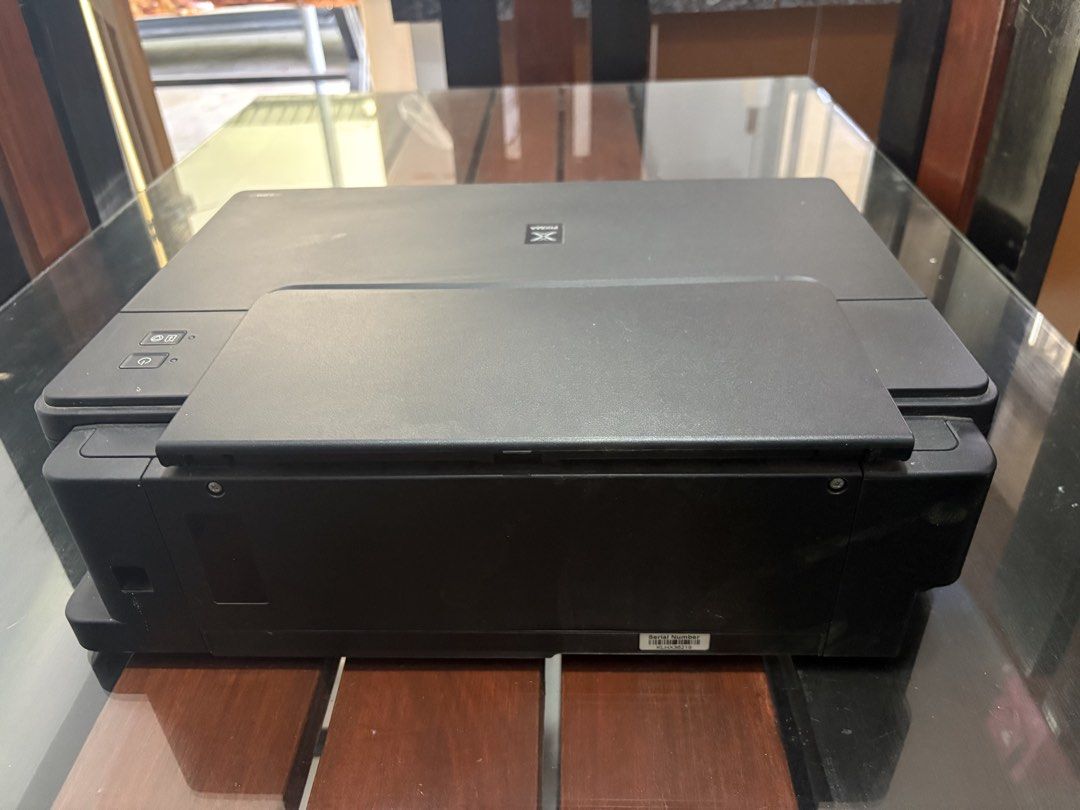 Canon PIXMA G1010 Ink Tank Printer (Category: Printers, Scanners & Copiers) located in Manila. Submitted by sykesporto66159 (Listing ID 1448313350, Image 2). Description: -Issue not printing Magenta Ink - Canon PIXMA G1010 Printer - Color: Black - Features: Ink Tank System - Ideal for: Home or Office Use - Condition: Tested and working - Reason for Selling: Upgraded setup - Included: Power cable.