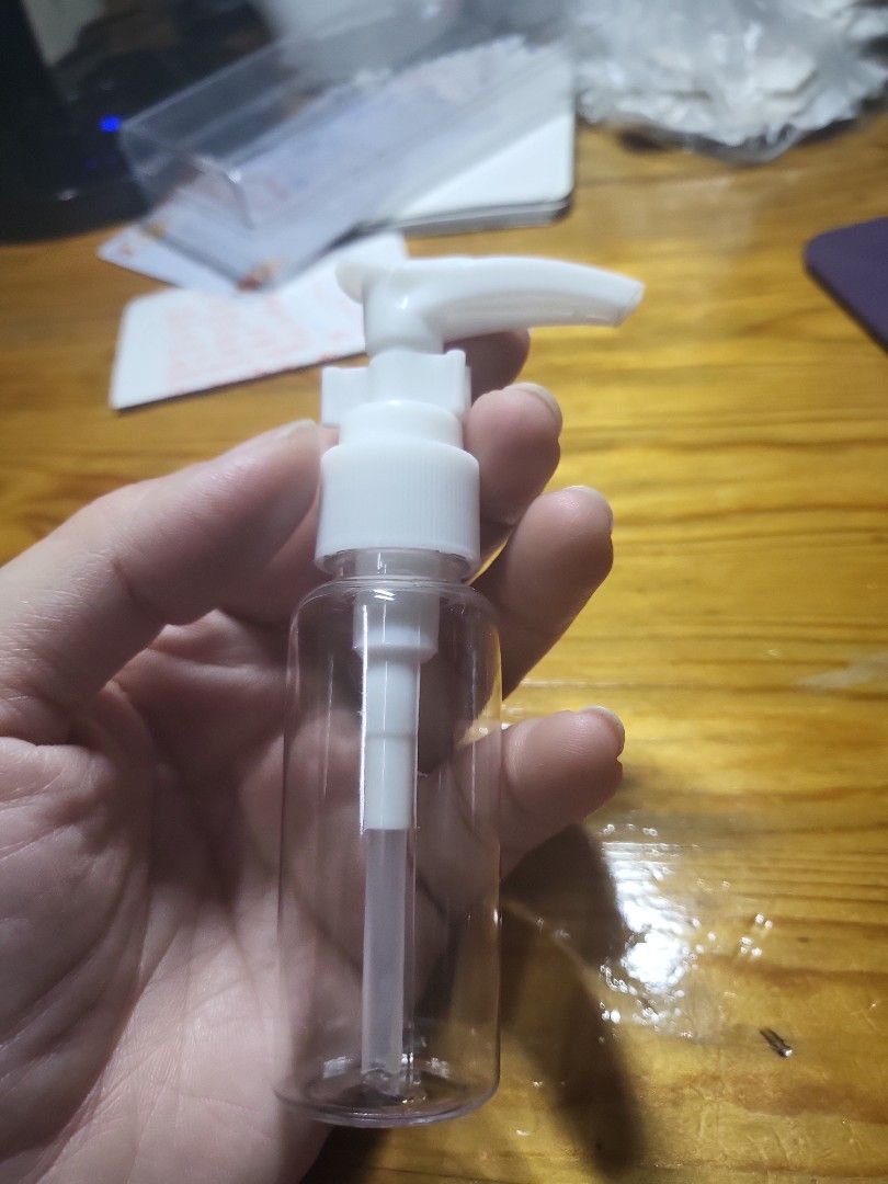 Clear Plastic Pump Bottle with White Pump Dispenser (Category: Sanitizers & Disinfectants) located in Caloocan City. Submitted by lynette1977 (Listing ID 1448304035, Image 1). Description: - Clear plastic bottle with white pump dispenser. - Ideal for travel or home use. - Suitable for liquids like lotion, soap, or sanitizer. - Functional pump mechanism, easy to refill and use. - Compact and convenient for carrying..