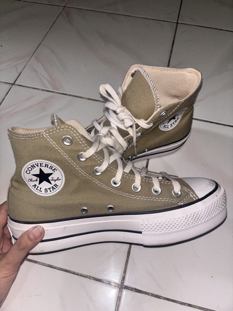Converse Chuck Taylor All Star High Top Platform Shoes (Category: Sneakers) located in Quezon City. Submitted by princessjacklyn (Listing ID 1448291441, Image 2). Description: Original Chuck Taylor High Top Platform Shoes - Khaki green - Platform sole for extra height - Size: US Women's 7.5 -Used twice only original price 3,900 Rfs. Decluttering.