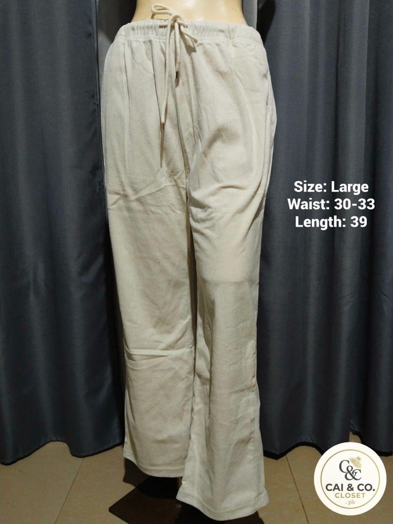 Cream Corduroy Pants - Size Large (Category: Other Bottoms) located in Roxas City. Submitted by caiandcoclosetph.v2 (Listing ID 1448474777, Image 1). Description: - Cream colored corduroy pants - Elastic waistband with drawstring - Size: Large (fits waist 30-33 inches) - Length: 39 inches - Comfortable and casual - Perfect for everyday wear.