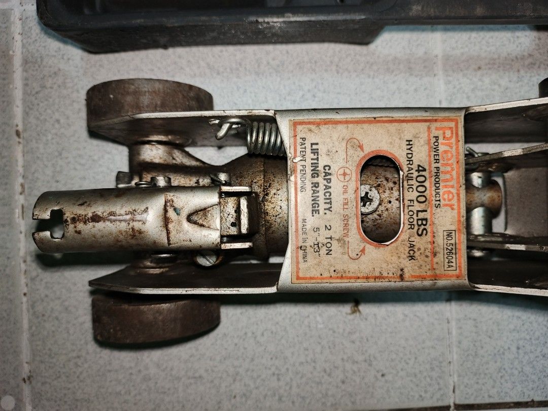 Crocodile Hydraulic Floor Jack (Category: Construction Tools & Equipment) located in Makati City. Submitted by julz2026 (Listing ID 1448288600, Image 1). Description: - Price is negotiable - Premier Power Products Hydraulic F - Capacity: 2 Ton - Lifting Range: 5" to 13" - Includes original case - Shows some signs of wear and rust, but fully functional.