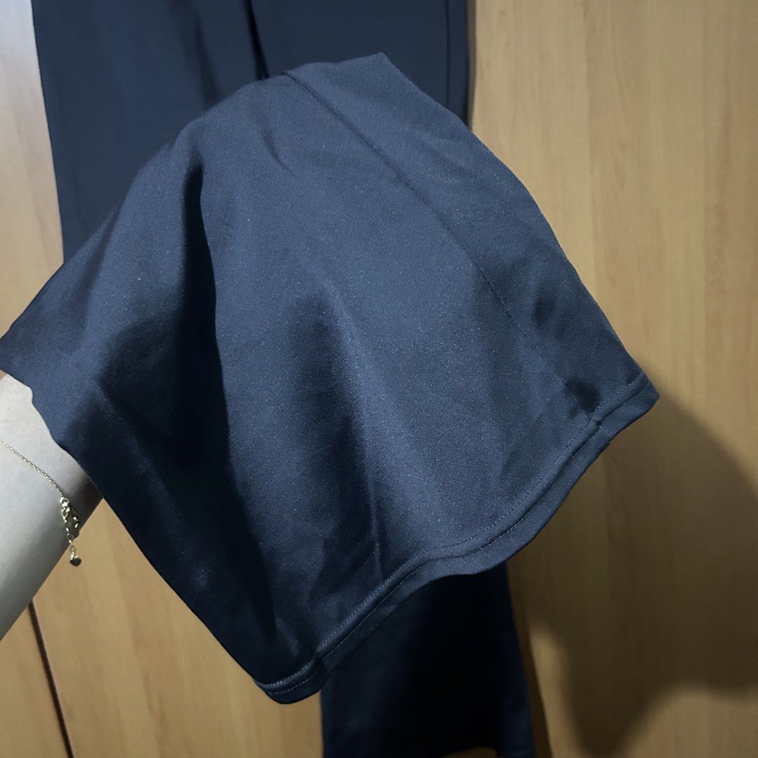 Dark Gray Flared Pants (Category: Other Bottoms) located in Mandaluyong City. Submitted by vwonu (Listing ID 1448404501, Image 3). Description: - High quality -Upto waist 32 -Stylish black high-waisted flared pants - Comfortable stretchy material - Flattering wide leg opening - Versatile: great for casual or dressed-up looks - Easy to pair with various tops and shoes - Ideal for everyday outfits.