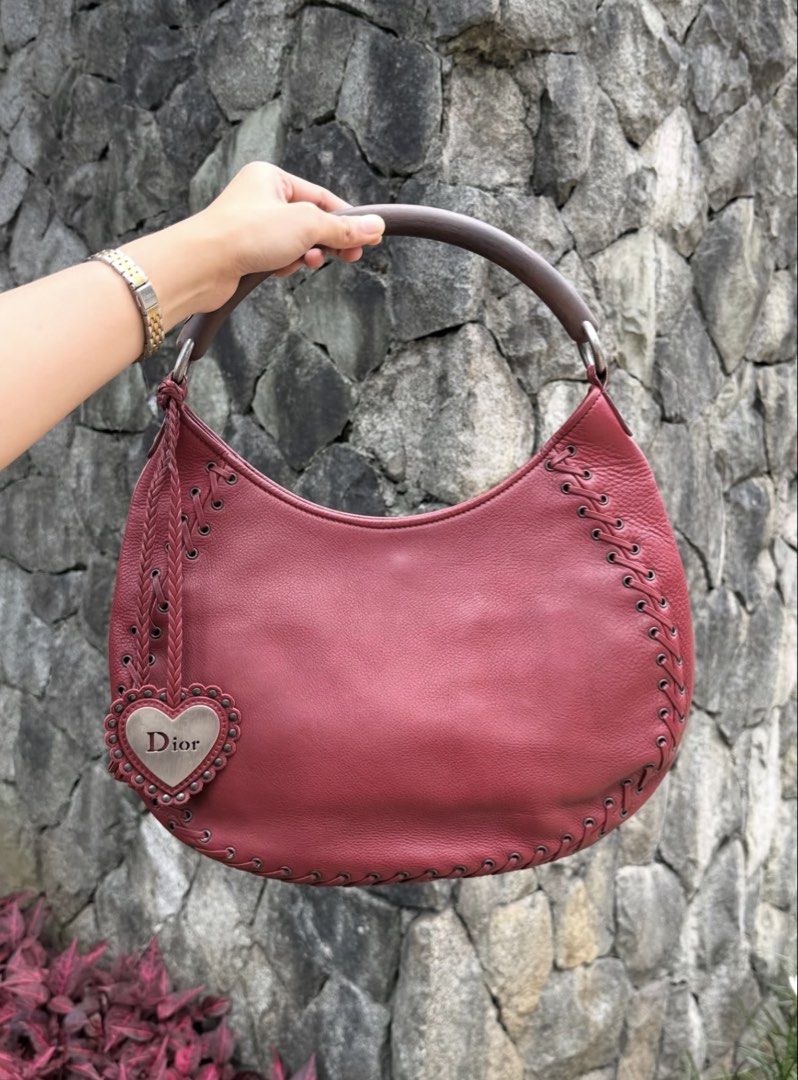 Dior 2002 Ethnic Round Hobo Bag (Category: Luxury Bags & Wallets) located in Makati City. Submitted by bearwithme04 (Listing ID 1448333419, Image 2). Description: Authentic christian dior 2002 ethnic round hobo bag Rank A no issue dm for pics louis vuitton , gucci , fendi.