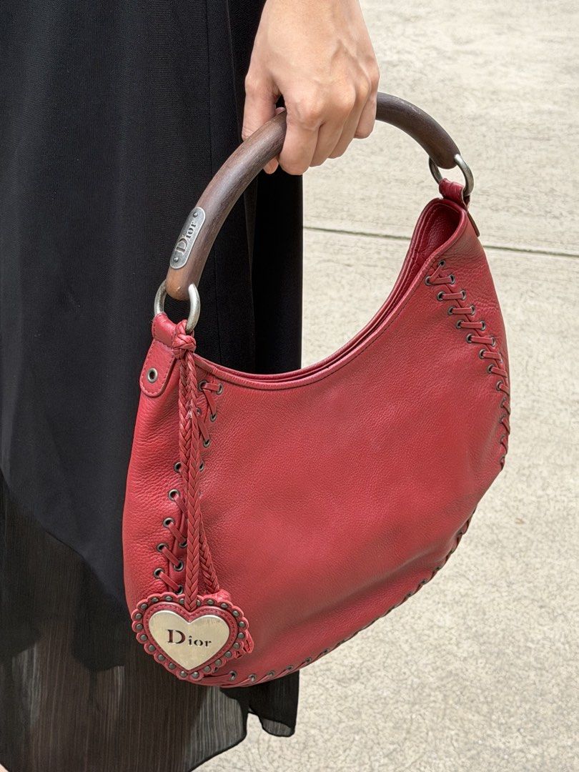Dior 2002 Ethnic Round Hobo Bag (Category: Luxury Bags & Wallets) located in Makati City. Submitted by bearwithme04 (Listing ID 1448333419, Image 1). Description: Authentic christian dior 2002 ethnic round hobo bag Rank A no issue dm for pics louis vuitton , gucci , fendi.