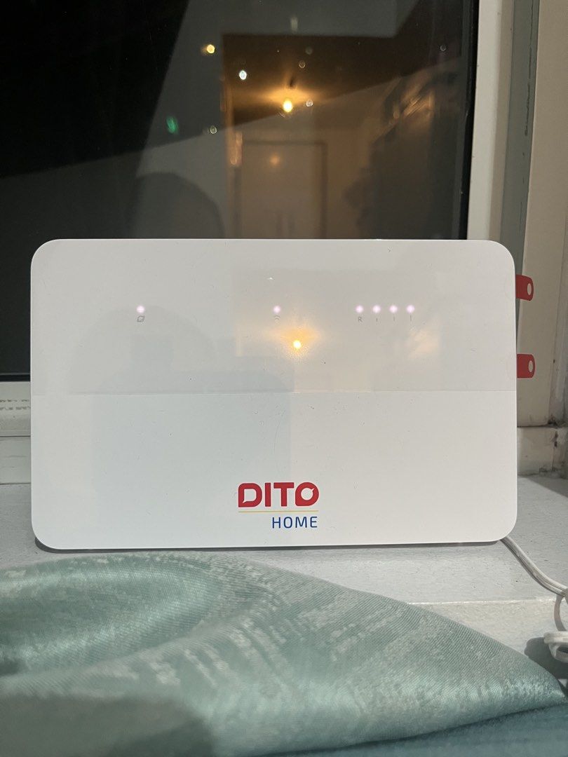 DITO Home WiFi Router (Category: Networking) located in Pasig City. Submitted by pamelanngo (Listing ID 1448445140, Image 1). Description: - DITO Home WiFi router - White casing - Indicator lights on top - Includes power cord - Tested and works well - Used for less than a month only.