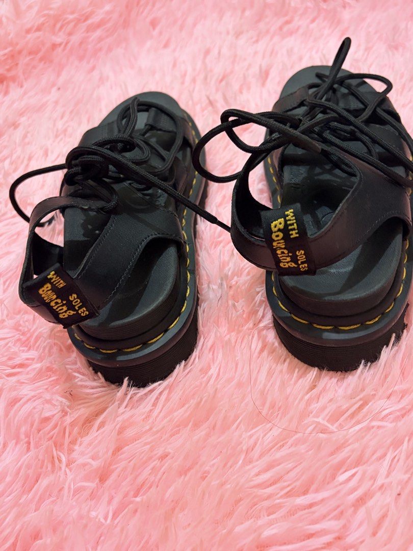 Dr. Martens Black Lace-Up Platform Sandals (Category: Flats & Sandals) located in Manila. Submitted by dapdappung (Listing ID 1448332842, Image 1). Description: - Black Dr. Martens platform sandals - Classic yellow stitching - Lace-up front - Adjustable ankle strap - Iconic 'With Soles Bouncing' heel tag - Adds an edgy touch to any outfit Used only twice .