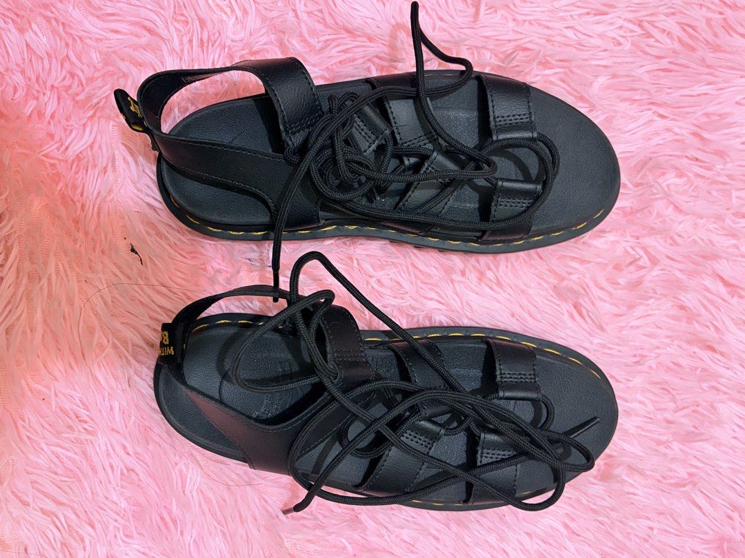 Dr. Martens Black Lace-Up Platform Sandals (Category: Flats & Sandals) located in Manila. Submitted by dapdappung (Listing ID 1448332842, Image 2). Description: - Black Dr. Martens platform sandals - Classic yellow stitching - Lace-up front - Adjustable ankle strap - Iconic 'With Soles Bouncing' heel tag - Adds an edgy touch to any outfit Used only twice .