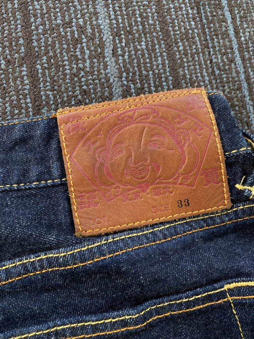Evisu Daicock Selvedge Jeans (Category: Jeans) located in Taguig. Submitted by offther4ck (Listing ID 1448351478, Image 3). Description: - Authentic - Issue: Crack on the paint but not noticeable - Complete Tags - With Qr - Waist: 33 - Length: 38.5 inches - Thigh: 11 inches - Leg hole: 7 inches.
