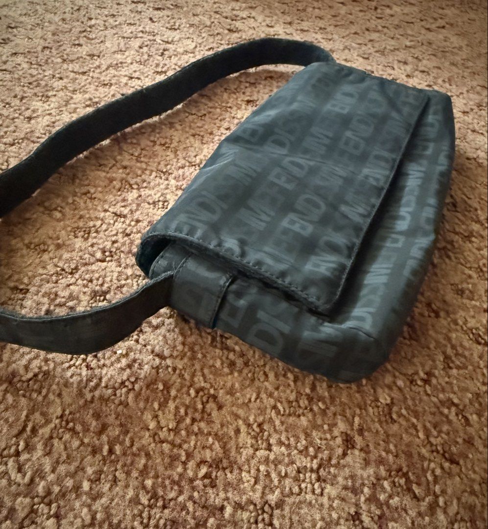 Fendi Fendissime Monogram Shoulder Bag (Category: Luxury Bags & Wallets) located in Bulacan. Submitted by rc_retailing (Listing ID 1448327576, Image 2). Description: - Authentic Black Fendi Shoulder Bag - All-over Fendissime Logo Print - Made in Italy - Main Compartment - Internal Zip Pocket - Adjustable Strap - Clean Inside and Out - Ideal for Everyday Use.