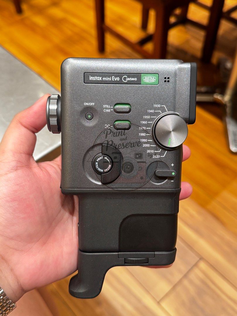 Fujifilm Instax Mini Evo Cinema (Category: Cameras) located in Las Pinas. Submitted by printandpreservebyk (Listing ID 1448479227, Image 1). Description: - Fujifilm Instax Mini Evo Cinema Camera - Hybrid instant camera: Shoot and print your photos instantly. - Retro design with modern functionality. - Choose between Still and Cine modes for versatile shooting. - Select different print styles with the dedicated dial. - Comes with a convenient grip