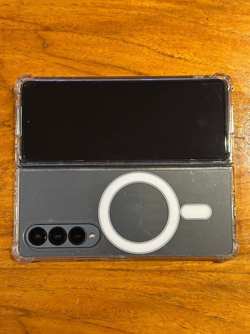 Galaxy Z Fold 4 (Category: Samsung) located in Quezon City. Submitted by henmor (Listing ID 1448382158, Image 3). Description: - Samsung Galaxy Z Fold 4 - Large 7.6" Foldable Dynamic AMOLED 2X Display - Factory Unlocked (Model: SM-F936B) - 256GB Storage - Fast Charging - Stereo Speakers - Reinforced Aluminum Hinge - Side-Mounted Fingerprint Sensor - Includes Premium Clear MagSafe Case.