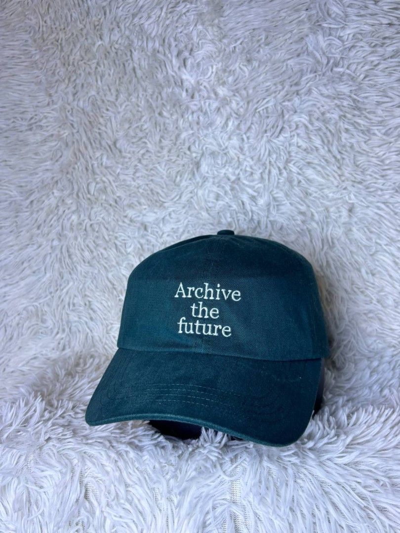 GU Archive the Future Embroidered Cap (Category: Caps & Hats) located in Catbalogan. Submitted by kristinapi (Listing ID 1448441145, Image 2). Description: - Dark green baseball cap - Features 'Archive the future' embroidery on the front - Classic and simple design - Adjustable strap at the back for a comfortable fit - Perfect for everyday wear and complements any outfit.