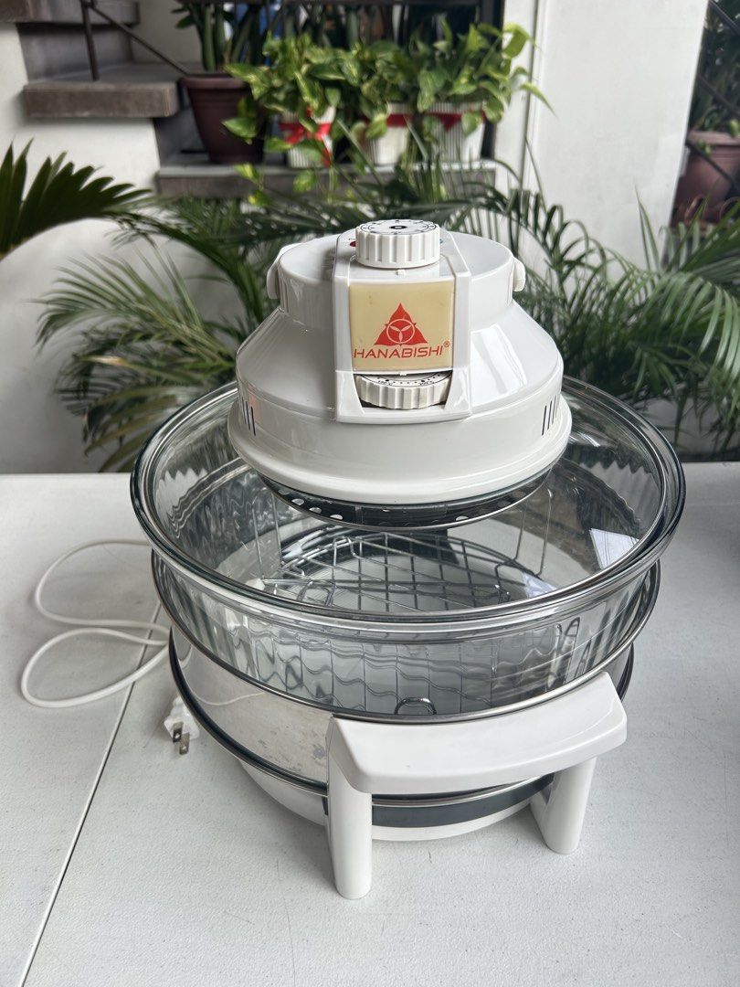Hanabishi Turbo Broiler (Category: Ovens & Toasters) located in Makati City. Submitted by declutter__queen (Listing ID 1448291056, Image 1). Description: - Hanabishi Halogen Oven - Clear glass bowl for easy viewing - Includes racks for versatile cooking - Adjustable temperature and timer settings - Ideal for roasting, baking, and more - Simple power and heat controls - Power cord included USED ONCE.