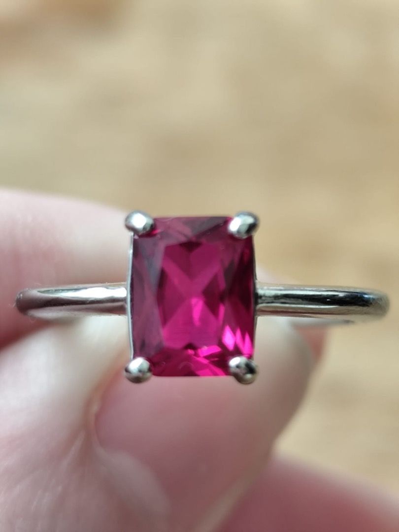 HIGH QUALITY 2 carat Natural Emerald-Cut Burmese Ruby Ring (UV REACTIVE!) (Category: Rings) located in Mandaluyong City. Submitted by allaboutgemsandco (Listing ID 1448347291, Image 1). Description: HIGH QUALITY 2 carat Natural Emerald-Cut Burmese Ruby Ring (UV REACTIVE!) Stone Size: 8.7mmx7.1mm Ring Size: Adjustable Price: Php 700 add shipping fee for order less than 1k REASON FOR SALE: Clearing out my collection. Bought from Myanmar Presenting 