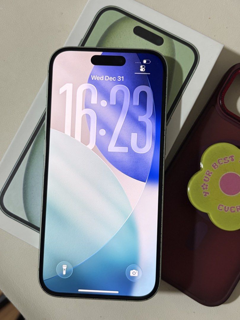 iPhone 15 (Category: iPhone 15 Series) located in Makati City. Submitted by apolnamaykagat (Listing ID 1447323966, Image 3). Description: iPhone 15 Green 128GB 84% battery health with original box, charger & case no issue. makinis! loc: bulacan.
