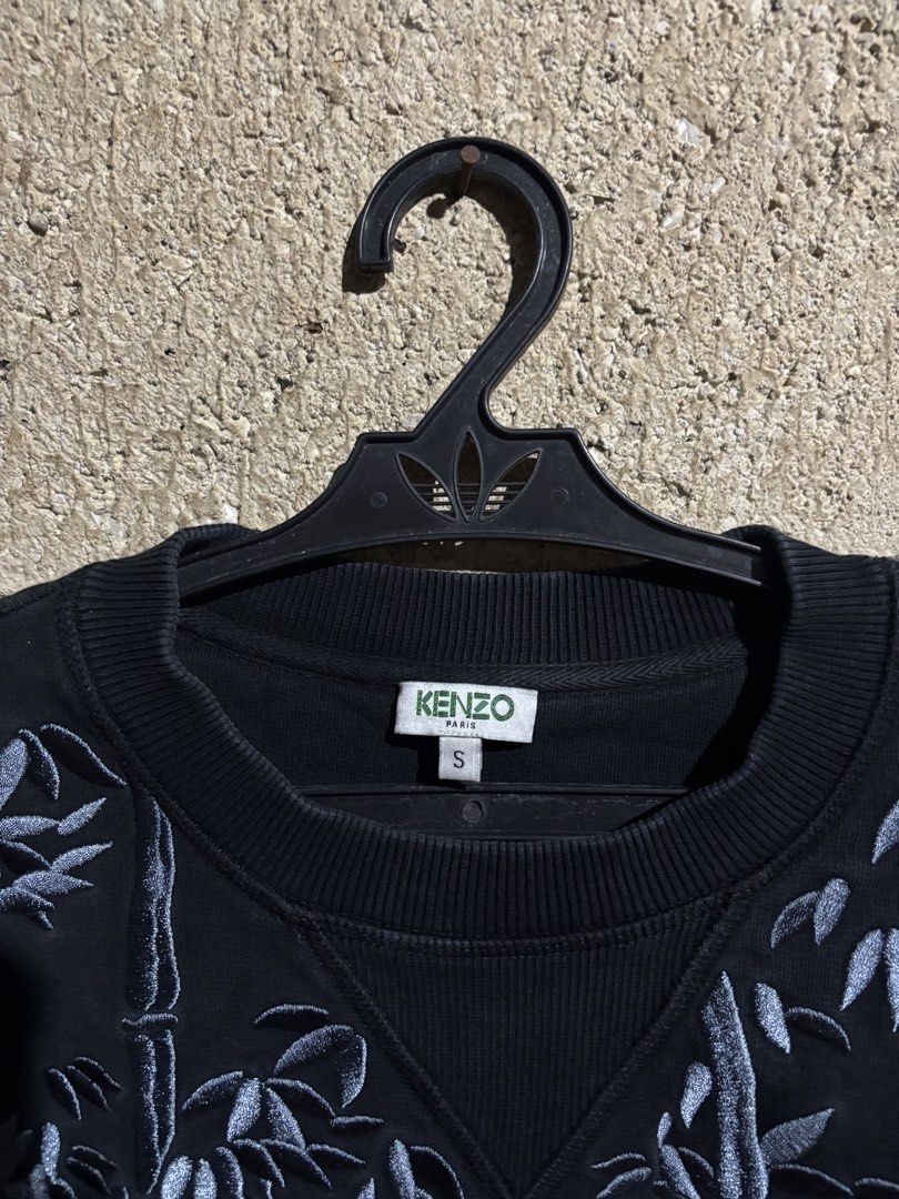 Kenzo Paris Black Tiger Bamboo Sweatshirt (Category: Luxury Apparel) located in Tagbilaran City. Submitted by noeeeelll (Listing ID 1448468162, Image 2). Description: - Black Kenzo Paris sweatshirt - Size S - Features embroidered tiger and bamboo design - Crew neck, long sleeves - Made in Portugal - Ideal for casual wear.
