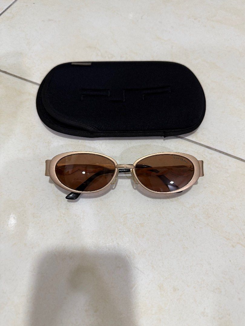 KRIZIA (Category: Sunglasses & Eyewear) located in Kuala Lumpur. Submitted by amireisley (Listing ID 1448461418, Image 1). Description: - KRIZIA Sunglasses - Elegant gold frame - Stylish brown lenses - Crafted in Japan - Comes with a protective case - Ideal for bright, sunny weather - Made in Japan - Has minor stretch .