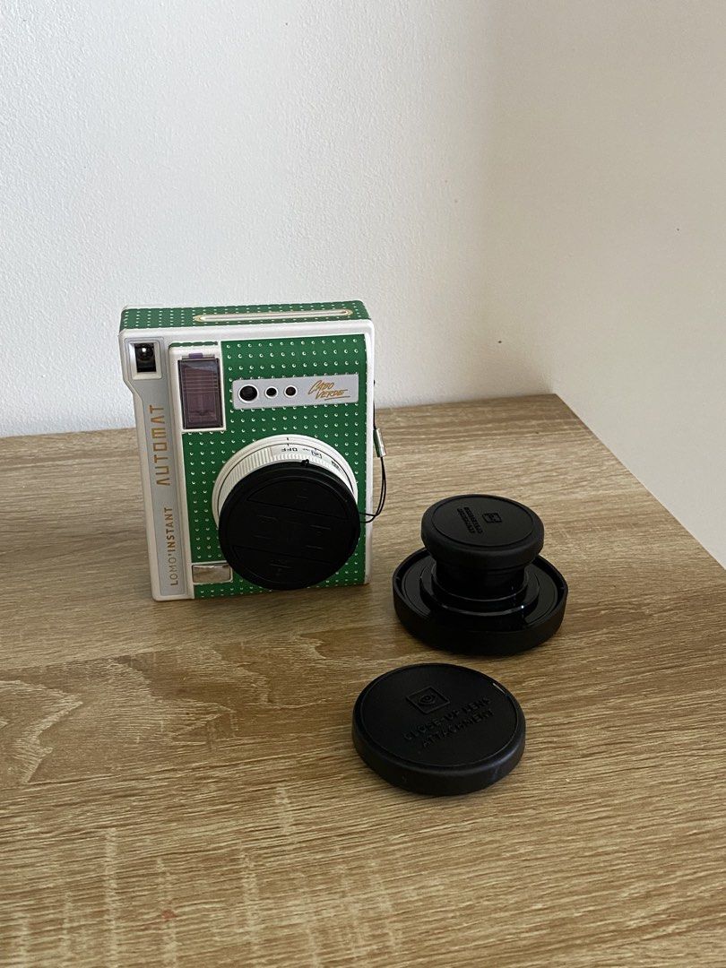 Lomo'Instant Automat Green Polka Dot Camera (Category: Cameras) located in Manila. Submitted by matchatanuki (Listing ID 1448302365, Image 3). Description: Lomo’instant Automat Lomography Camera - Wallet-sized instant Photos - Uses Fujifilm Instax Mini Film - Boxed and used twice only - Has warranty (only valid is Japan) - Built in 60mm lens (35mm equivalent) - Bought from Europe - Runs on two CR2 batteries (already in the cam) Inclusions: - Remo