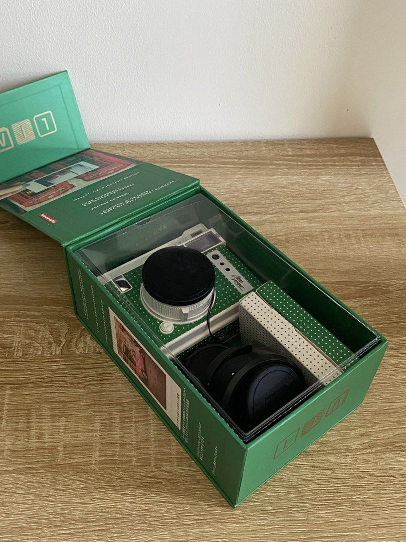 Lomo'Instant Automat Green Polka Dot Camera (Category: Cameras) located in Manila. Submitted by matchatanuki (Listing ID 1448302365, Image 2). Description: Lomo’instant Automat Lomography Camera - Wallet-sized instant Photos - Uses Fujifilm Instax Mini Film - Boxed and used twice only - Has warranty (only valid is Japan) - Built in 60mm lens (35mm equivalent) - Bought from Europe - Runs on two CR2 batteries (already in the cam) Inclusions: - Remo